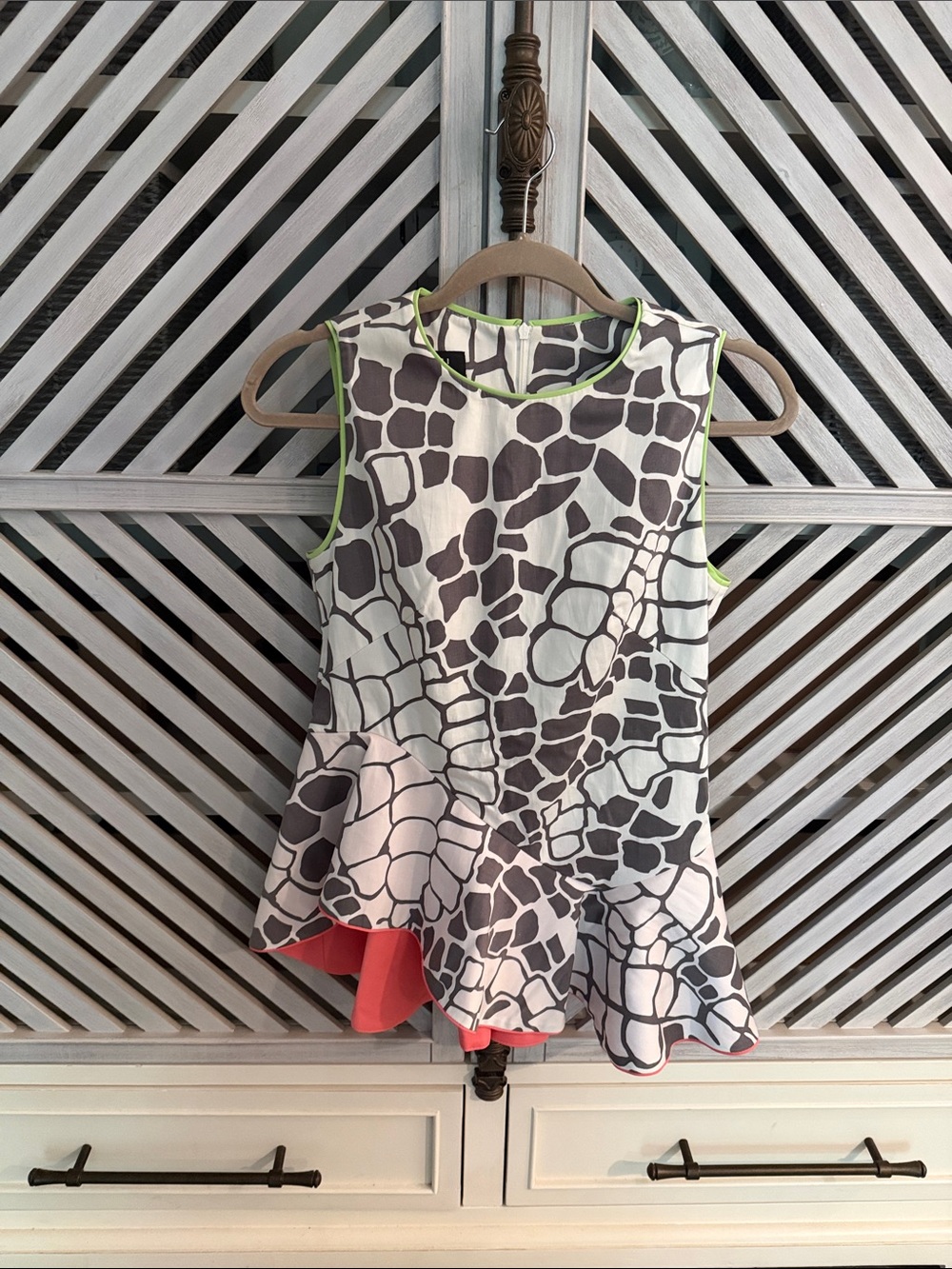 Abstract Print Asymmetric Peplum Sleeveless Top Contrast Trim